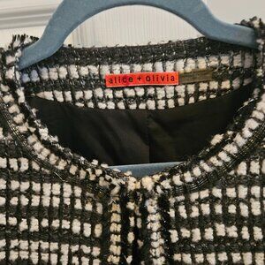 Black cropped blazer.